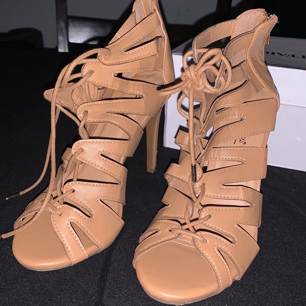 A khaki maybe beige mix lace up heel. Size 7 1/2. An Anne Michelle design